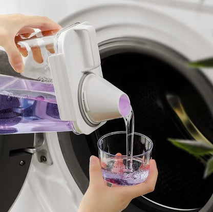 Pojemnik z dozownikiem i miarką na płyn do prania 1,8l, przeżroczysty